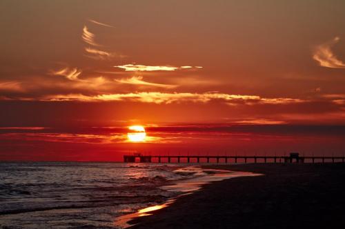 Sunset over the Gulf State Park Pier